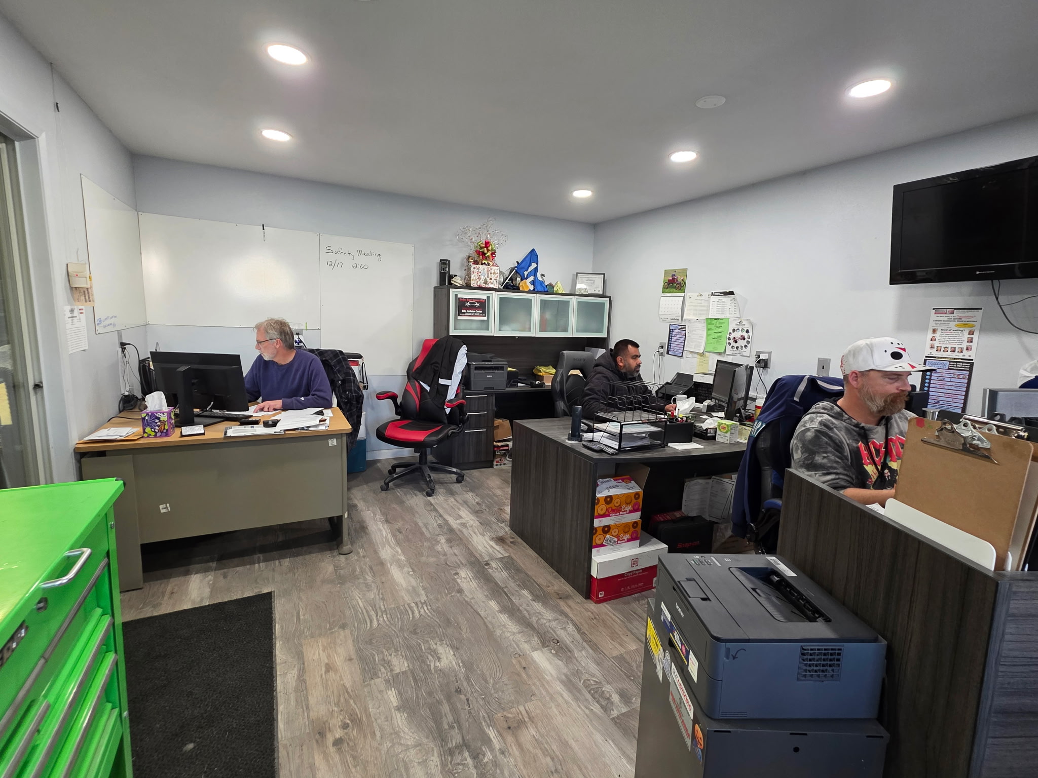 Some of our employees in the office.